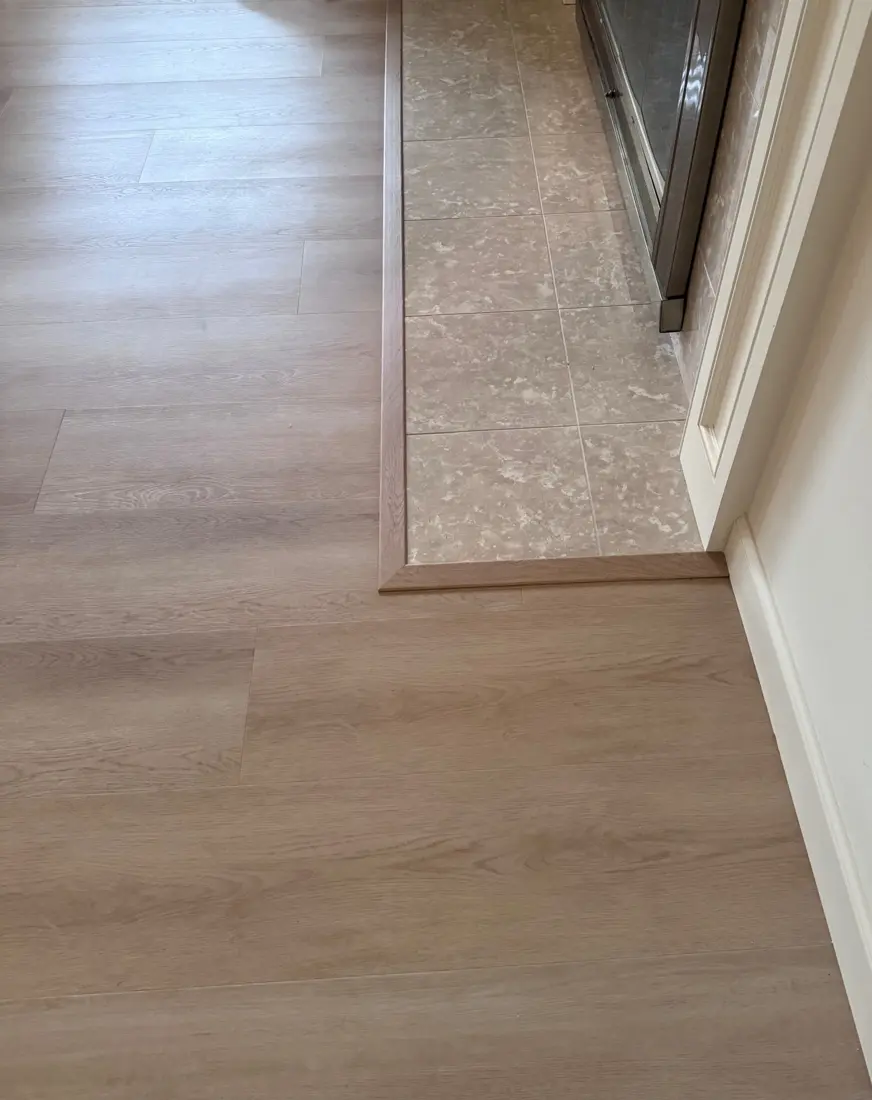 Medieval Floors Marseille Collection in Madrid with stone tile transition and oak trim, Hillsborough, CA